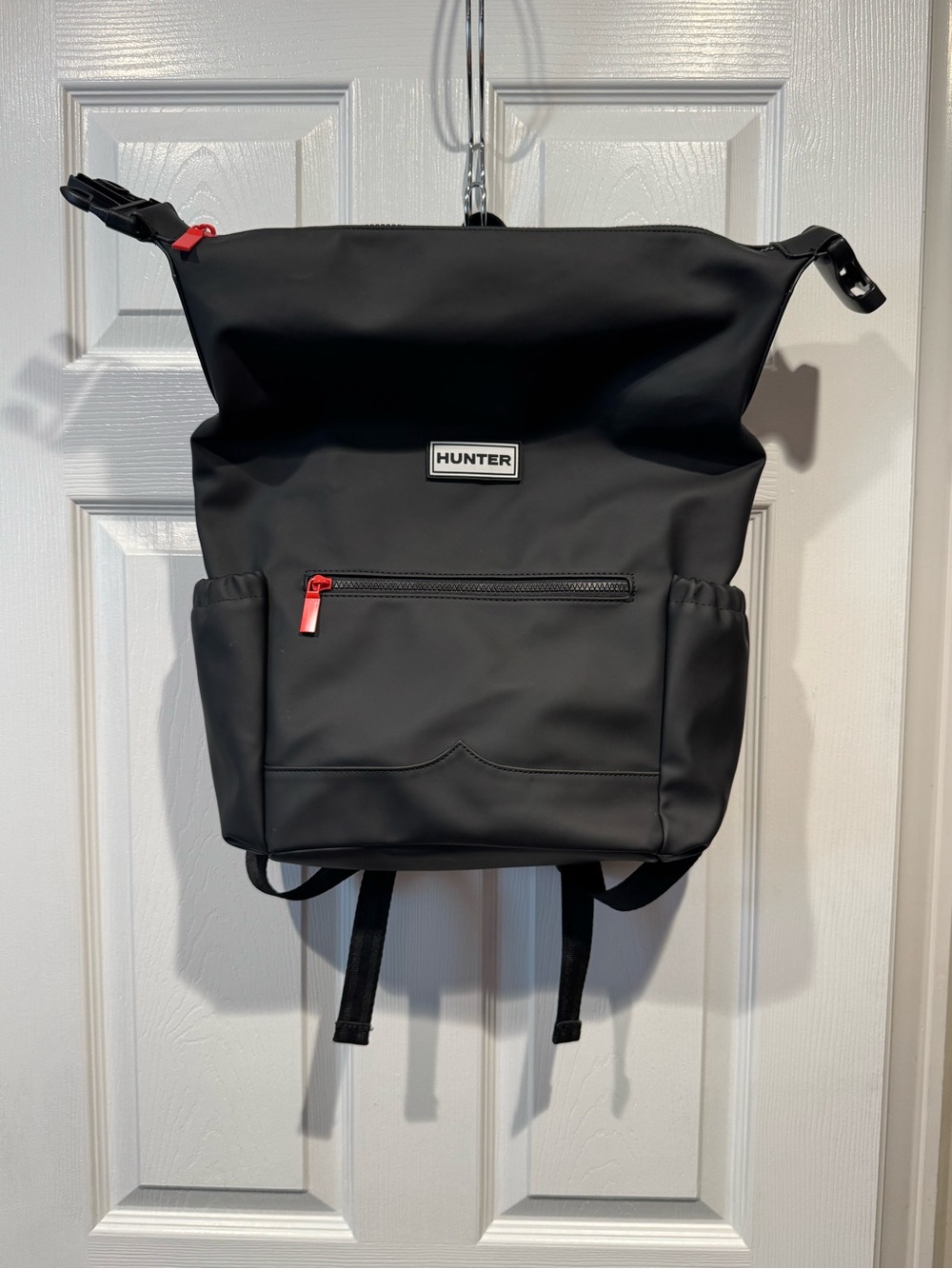 Hunter Black Roll-Top Backpack with Red Zipper Accent